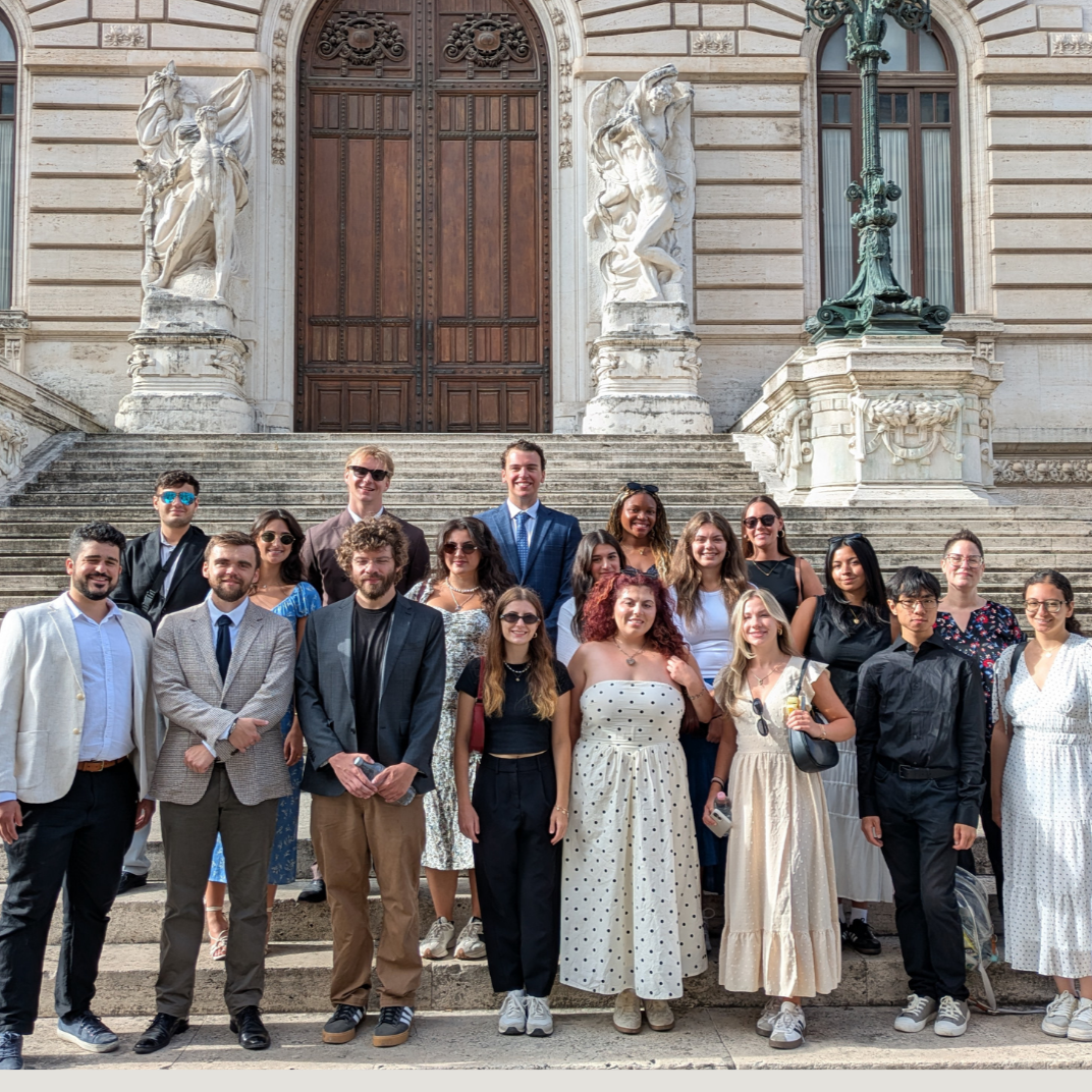 Students and teachers stood in front of a building in Rome.